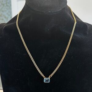 TOVA - Light Blue Emerald Cut Crystal Pendant Necklace on Gold Tone Chain